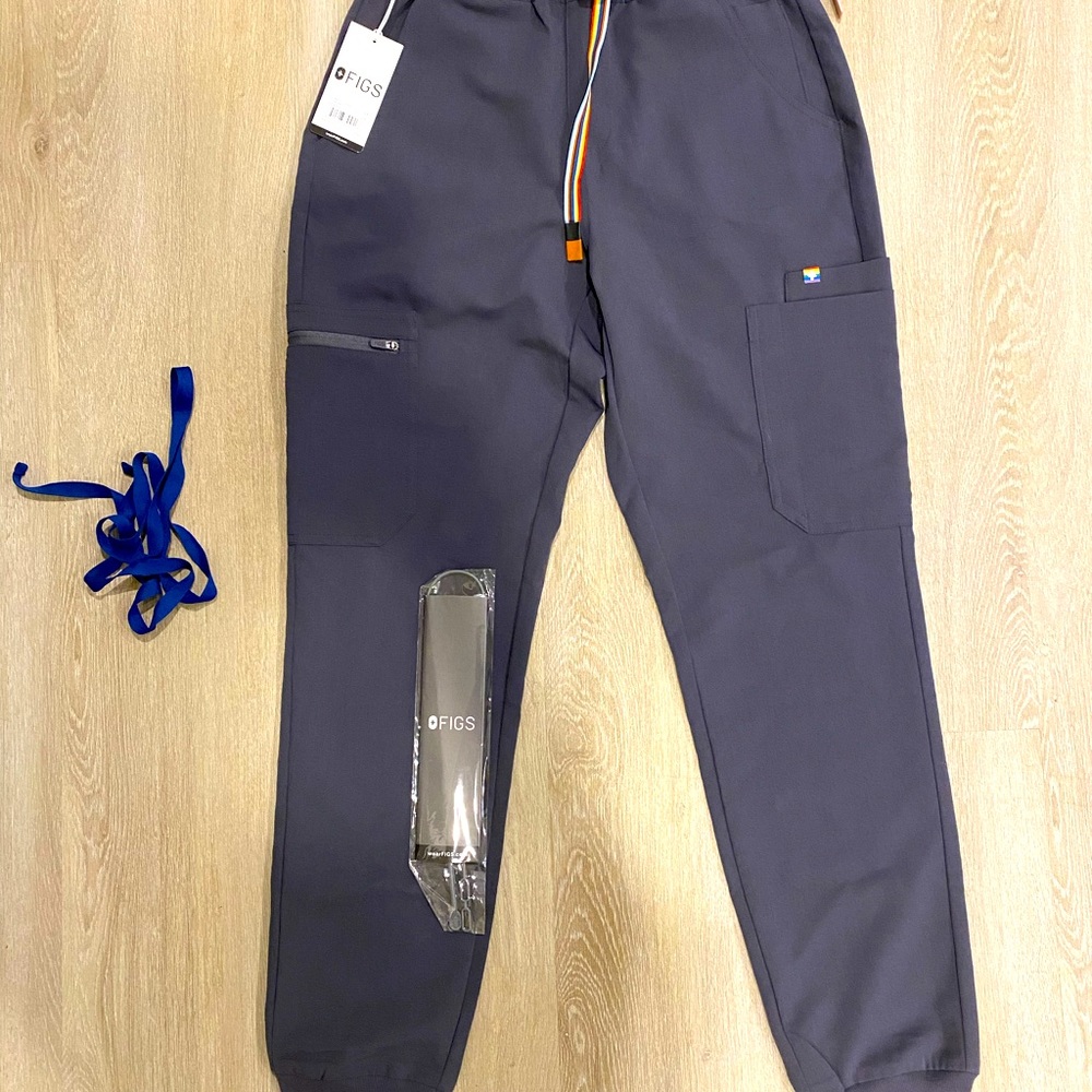 Brand new FIGS Pride. XS.Tag still intact. Red J on cut out tag. Both cords.